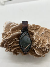 Load image into Gallery viewer, Hand Carved Moss Agate &amp; Natural Emerald Oxidized Copper Wire Wrap Pendant
