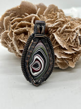 Load image into Gallery viewer, Hand Carved Jeep Fordite &amp; Garnet Oxidized Copper Wire Wrap Pendant
