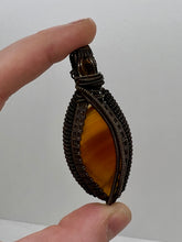 Load image into Gallery viewer, Hand Carved Carnelian &amp; Heat Treated Amethyst Oxidized Copper Wire Wrap Pendant

