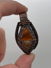 Load image into Gallery viewer, Hand Carved Dino Bone &amp; Carnelian Oxidized Copper Wire Wrap Pendant
