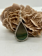 Load image into Gallery viewer, Hand Carved Echo Ridge Jasper Sterling Silver Wire Wrap Pendant
