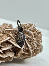 Load image into Gallery viewer, Hand Carved Fordite Oxidized Copper Wire Wrap Pendant
